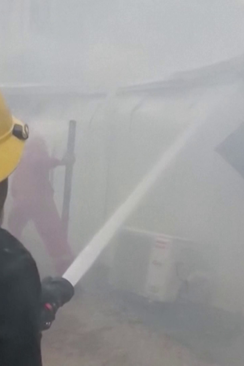 Firefighters stop fire at drone-hit foreign oil storage units in Basra