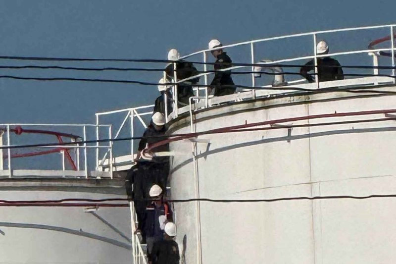 Officials check an oil depot in Surat Thani on April 1. (Photo: Department of Special Investigation)