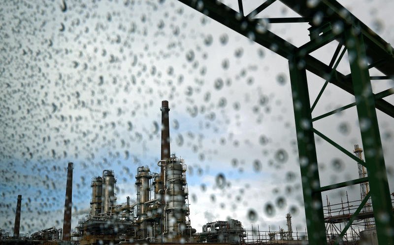 A general view of the PCK refinery, a crude oil processing facility supplying gasoline, jet fuel, diesel and fuel oil, is seen through a rain‑spattered window in Schwedt/Oder, Germany, on March 31, 2026. (Photo: Reuters)