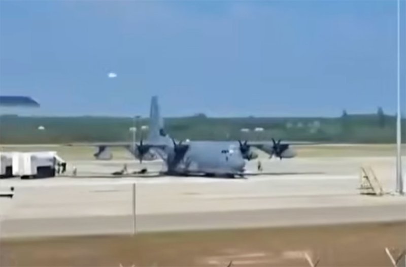 A US C‑130 military transport aircraft at Krabi airport explained by the air force as part of routine US troop rotation and medical evacuation missions. (Screengrab from CH7HD News)