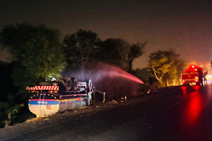 Bangkok Post - Loaded fuel tanker flips after driver dozes off