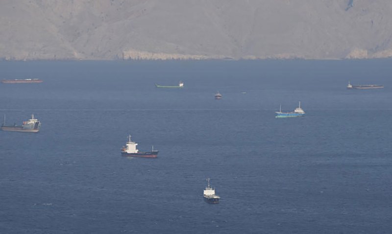 Ships and tankers in the Strait of Hormuz off the coast of Musandam, Oman, on Saturday. (Photo: Reuters)