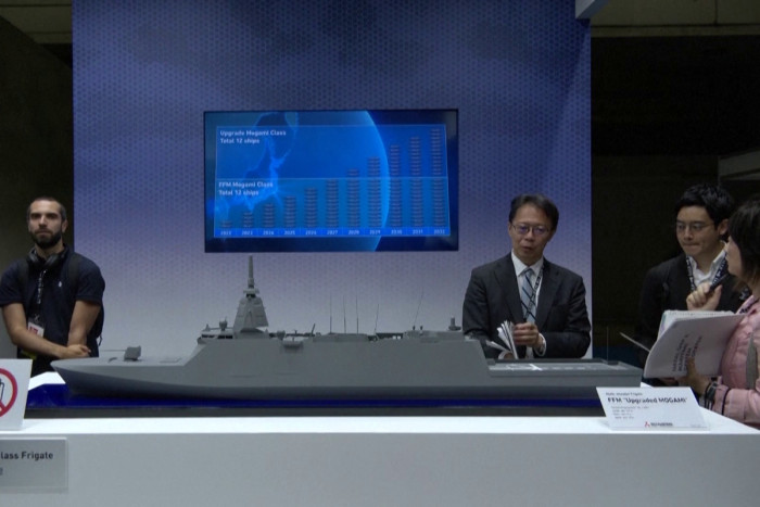 Japan scraps arms export limits, opens door to global market