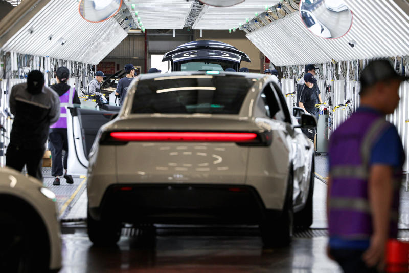 Employees work at the Tesla Gigafactory during a government-organised media trip in Shanghai, China, on April 14, 2026. (File photo: Reuters)