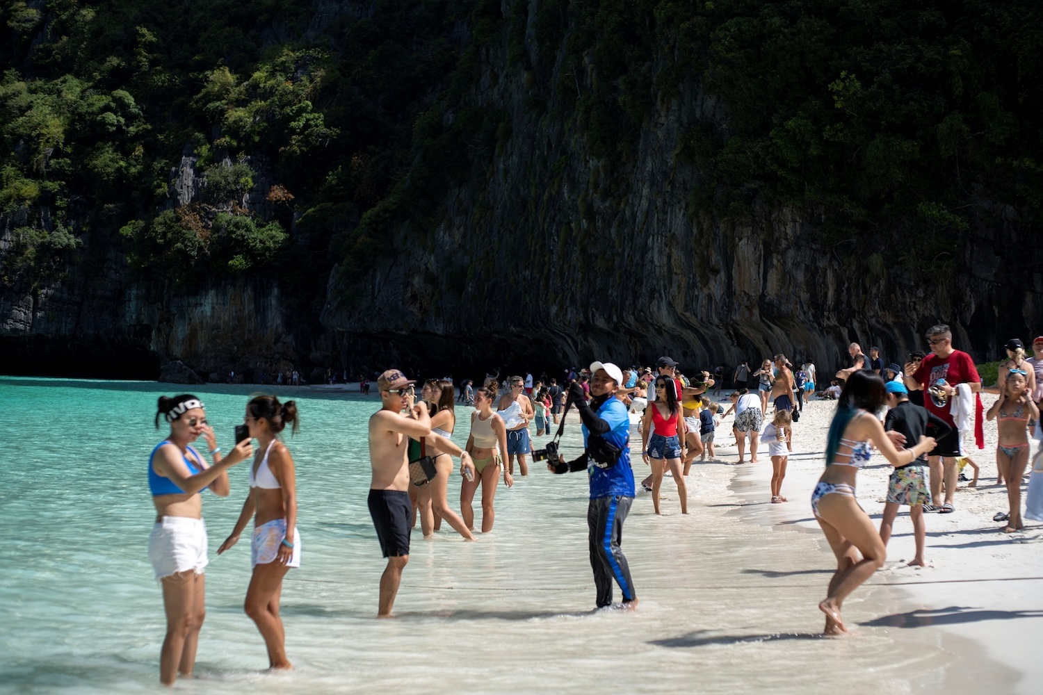 Tourists visit Maya Bay in Krabi, where its world-famous beach was reopened after being closed for three years to allow the ecosystem to recover from the impact of overtourism, in January 2022. (Photo: Reuters)