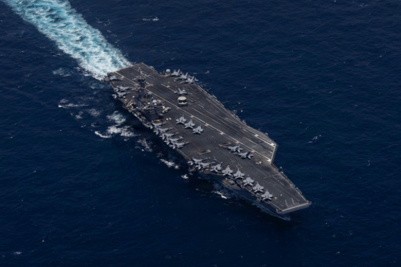US pauses guiding ships through Hormuz, cites Iran deal hopes