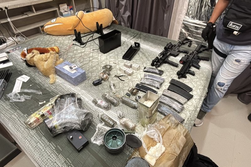 Some of the military-grade weapons discovered at the Pattaya home of Chinese suspect Sun Mingchen, 31, following a car crash on Friday. Police suspect they have stumbled on an illegal sales network. (Photos: supplied/ Wassayos Ngamkham)