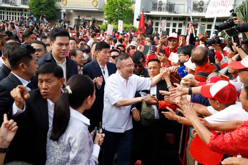 Thaksin Shinawatra meets supporters as he leaves Klongprem Central Prison in Bangkok on Monday morning. (Photo: Pattarapong Chatpattarasill)