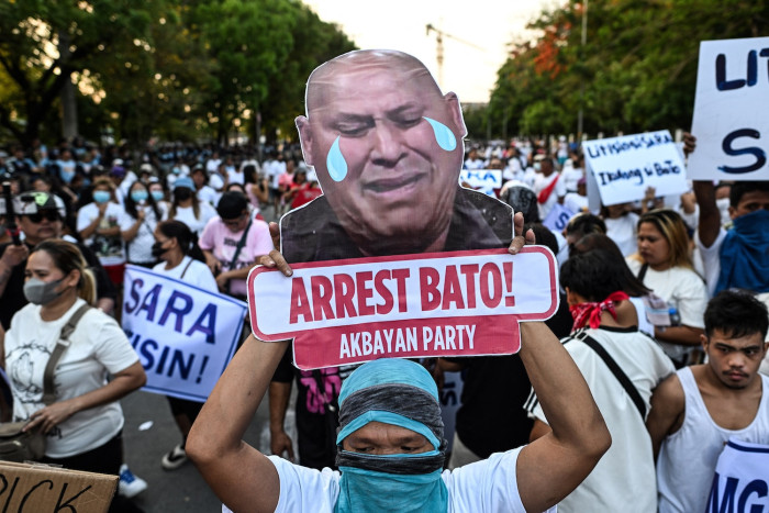 Philippine senator wanted for ‘war on drugs’ trial flees