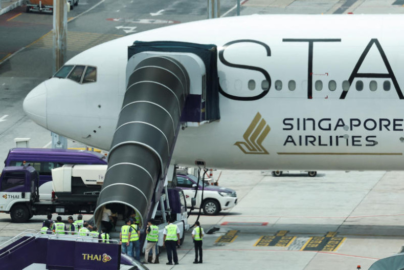 Singapore Airlines flags surging fuel costs; annual profit halves on one-offs