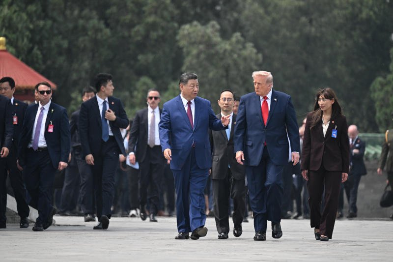 President Xi Jinping of China, front left, and US President Donald Trump, front right, visit the Temple of Heaven in Beijing during their two-day summit on Thursday. Thursday’s meeting in Beijing between the two leaders took place mostly behind closed doors. Still, the first day of the summit produced some revelatory moments. (Photo: New York Times)