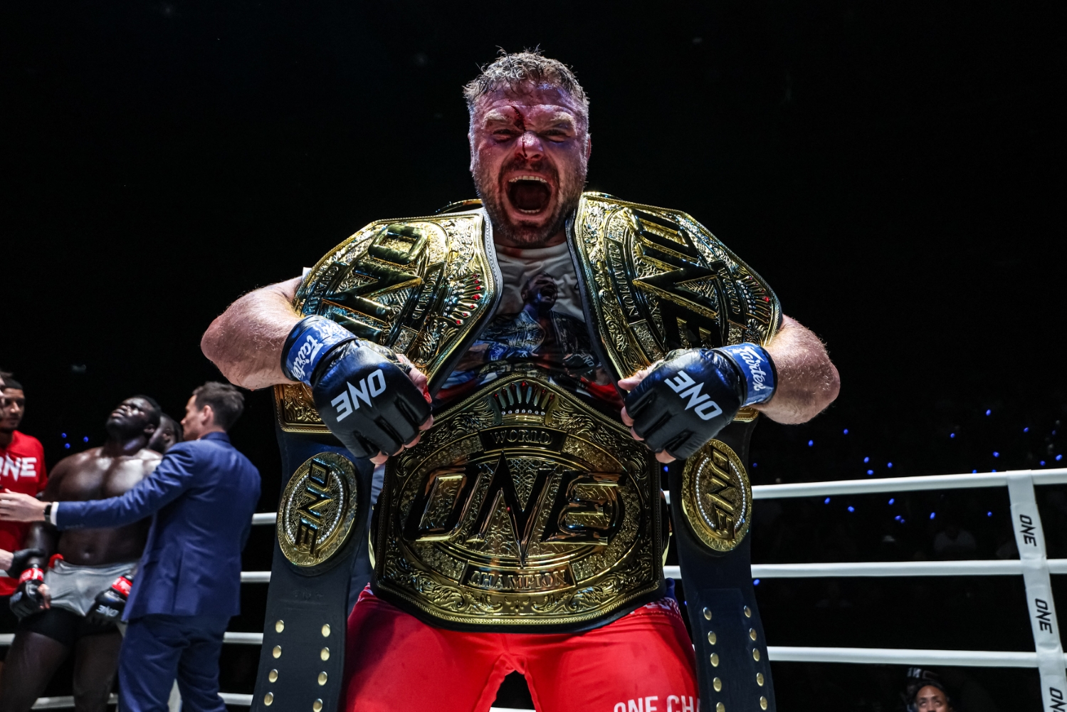 Anatoly Malykhin celebrates after regaining three-division champion status in ONE Championship