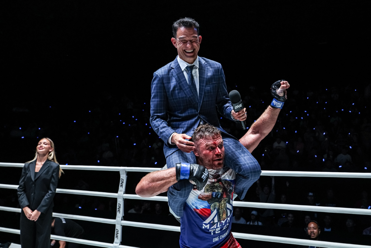 Anatoly Malykhin carries Mitch Chilson on his shoulders around the ring