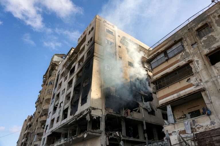 Smoke billows from a residential building that was hit by an Israeli strike in the Rimal neighbourhood of Gaza City, where Israel said Ezzedine Al-Haddad, chief of the armed wing of Hamas, was killed on May 15, 2026. (Photo: AFP)