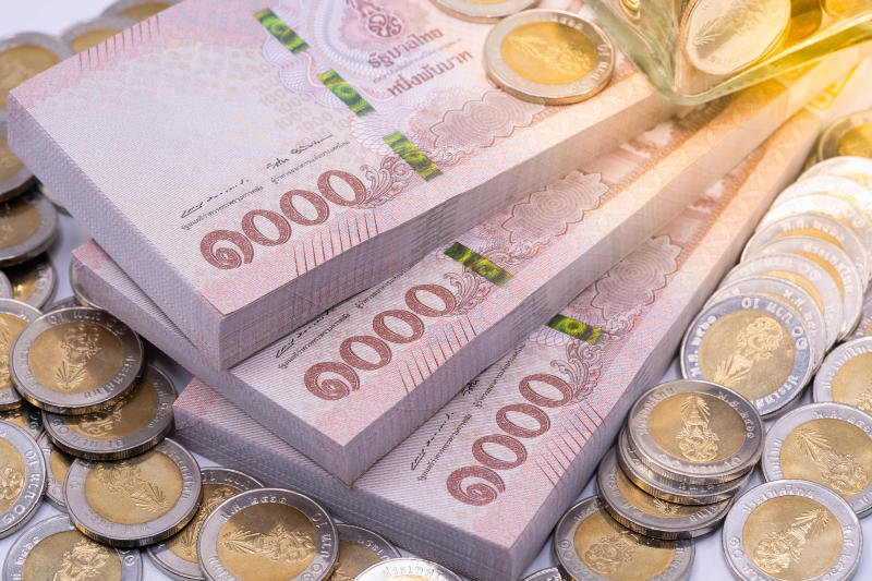 Thai baht banknotes and coins. (Deposit Protection Agency photo)