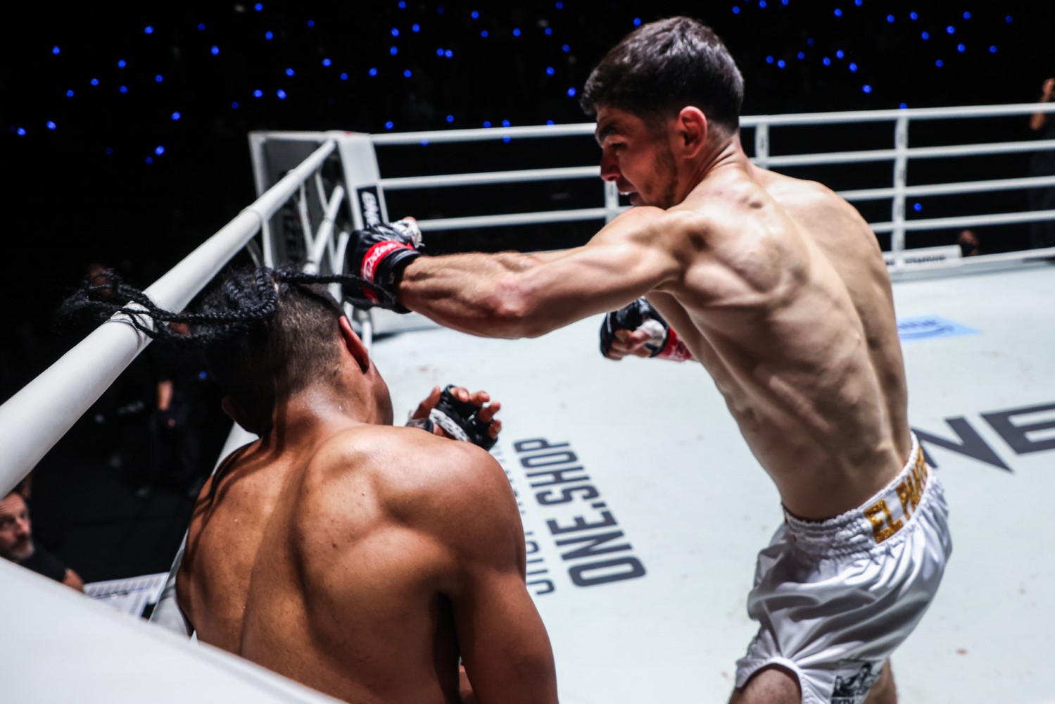 Aslamjon Ortikov throws a left hook at Jordan Estupinan at ONE Fight Night 43