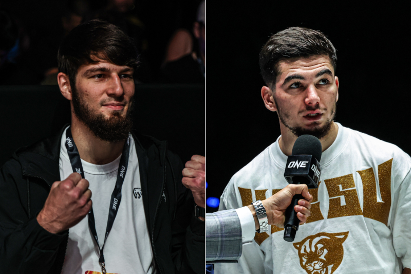 Asadula Imangazaliev (left) sits at ringside while Aslamjon Ortikov gives an in-ring interview at ONE Fight Night 43
