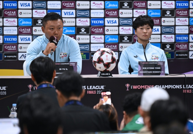 North Korea's Naegohyang Women's FC head coach Ri Yu Il, left, and captain Kim Kyong Yong attend a press conference at Suwon Sports Complex ahead of the Women's Asian Champions League semi-final. (Photo: AFP)