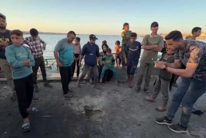 Israeli strike kills Palestinians at Gaza seaport cafe, medics say