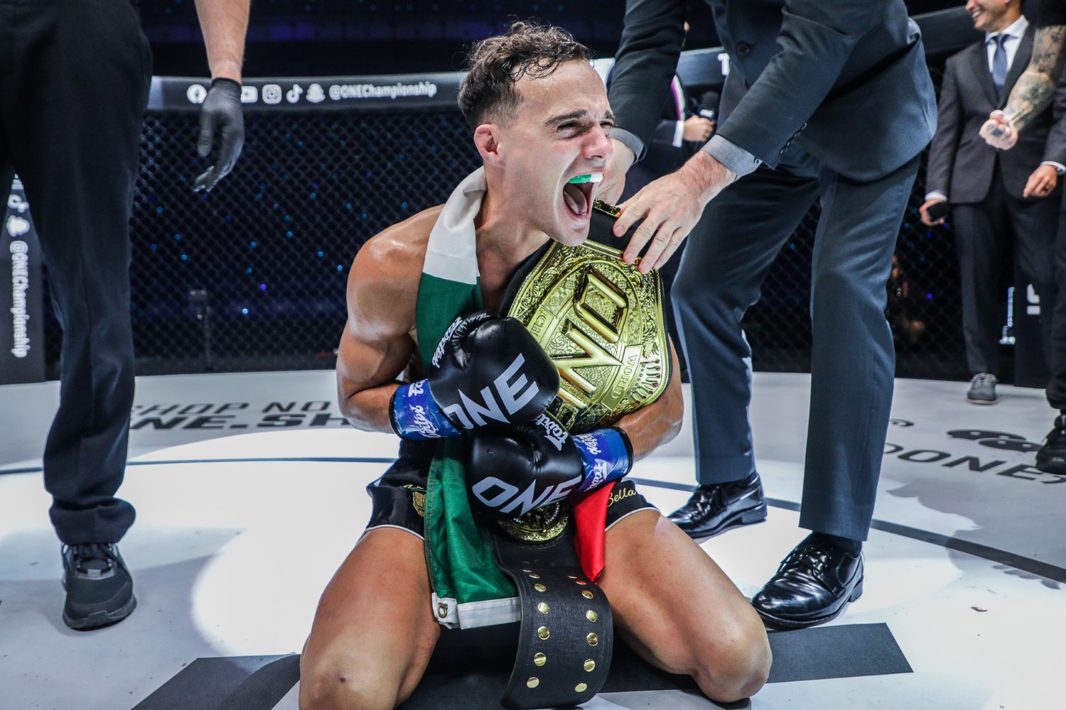 Jonathan Di Bella celebrates after beating Zhang Peimian by unanimous decision at ONE 162