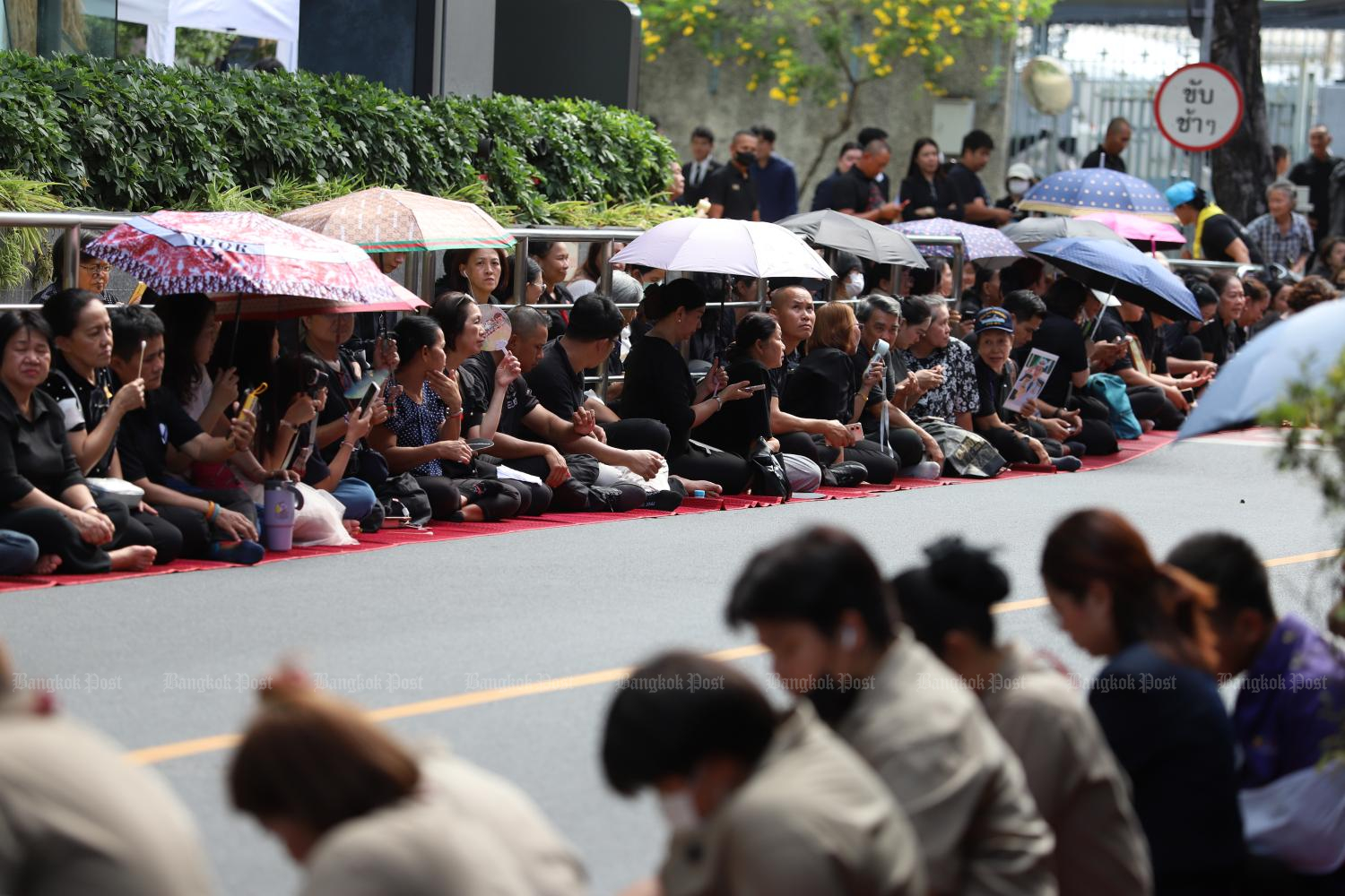 Mourners line procession route to pay tribute to Princess Bajrakitiyabha