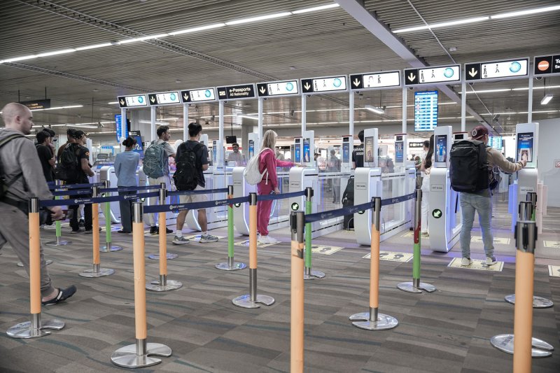 Travellers use the new autogates after arriving at Phuket Airport on Saturday. (Photo: Phuket Airport)