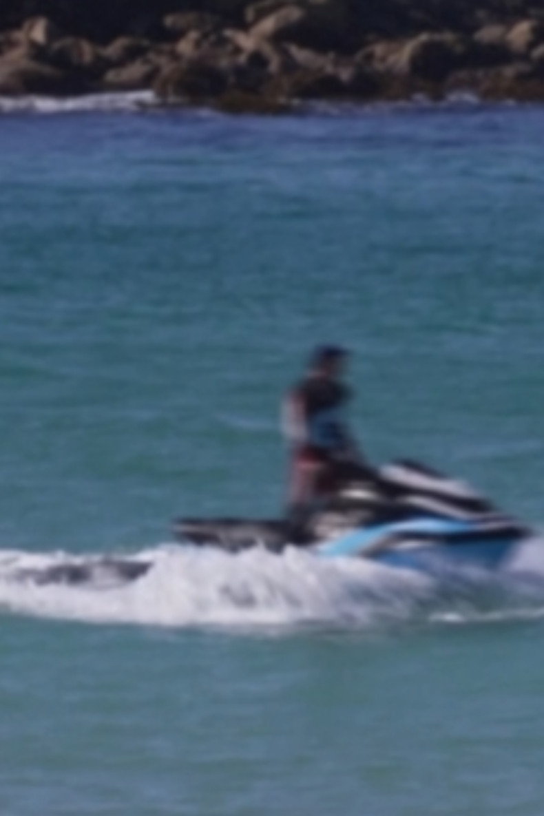 Witness saw 'pool of blood' as shark mauled woman at Sydney beach