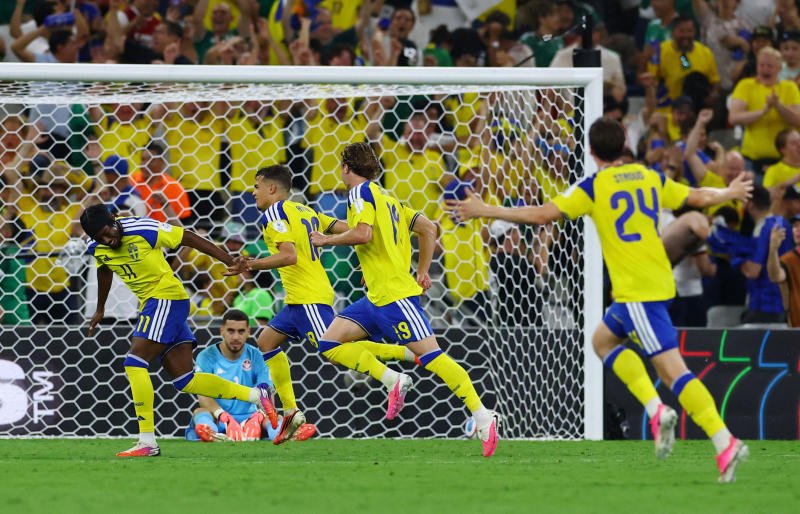 Swedish players celebrates during the match between Sweden and Tunisia in Montery, Mexico, on Sunday. (Photo: Reuters)
