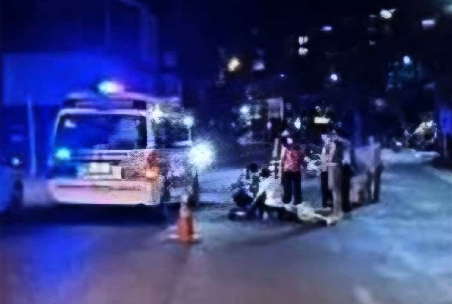 Rescue workers and medics prepare to take a Scottish boxer to a hospital for treatment of severe injuries after he fell from a tuk-tuk in the Patong area of Phuket in the early hours of Sunday, June 14. Colin Cairney, 22, subsequently died. (Photo supplied/Achadthaya Chuenniran)