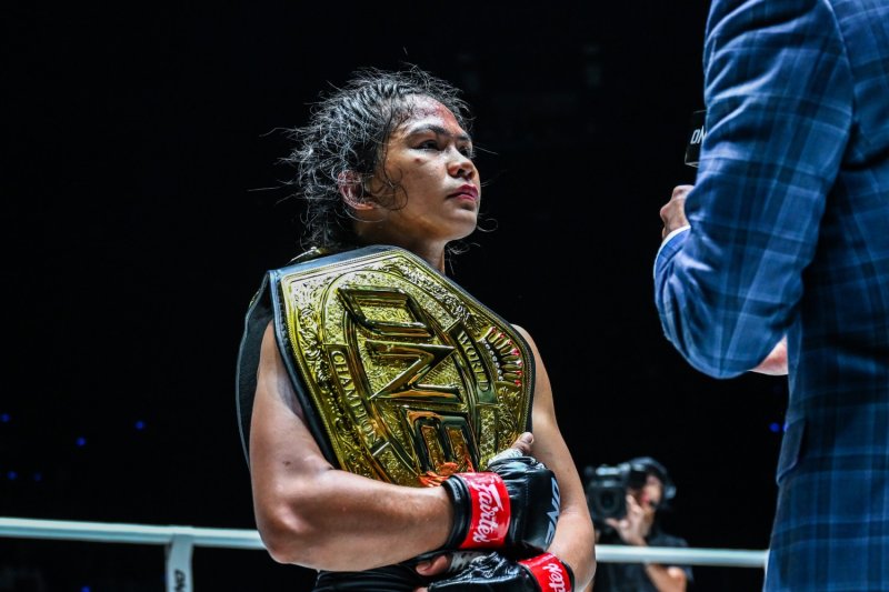 Denice Zamboanga reacts after winning the ONE interim atomweight MMA world title with victory over Alyona Rassohyna in Bangkok