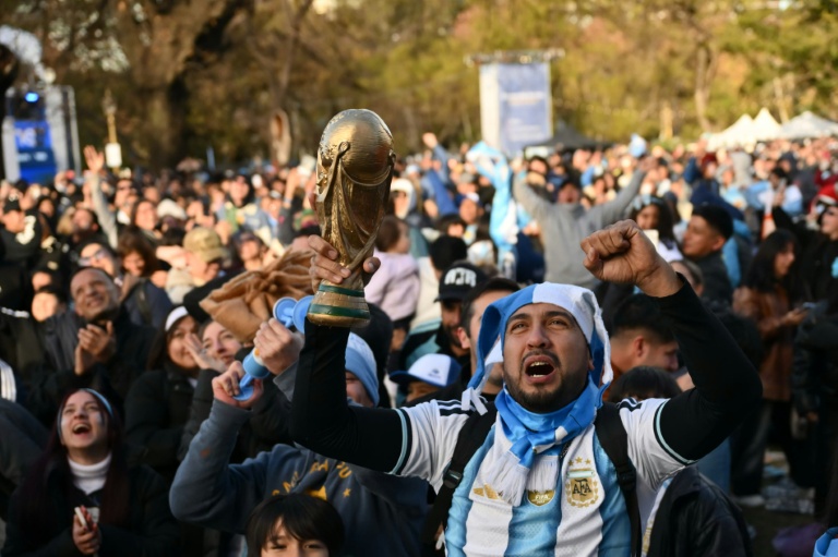 Argentina football fans celebrated iconic World Cup moments by two of their football legends the late Diego Maradona and Lionel Messi