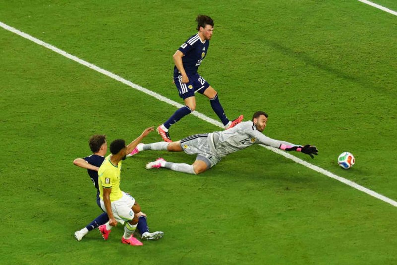 Brazil's Matheus Cunha scores their third goal. REUTERS