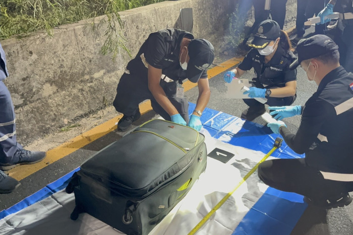 Australian held after teen girl's body found in suitcase