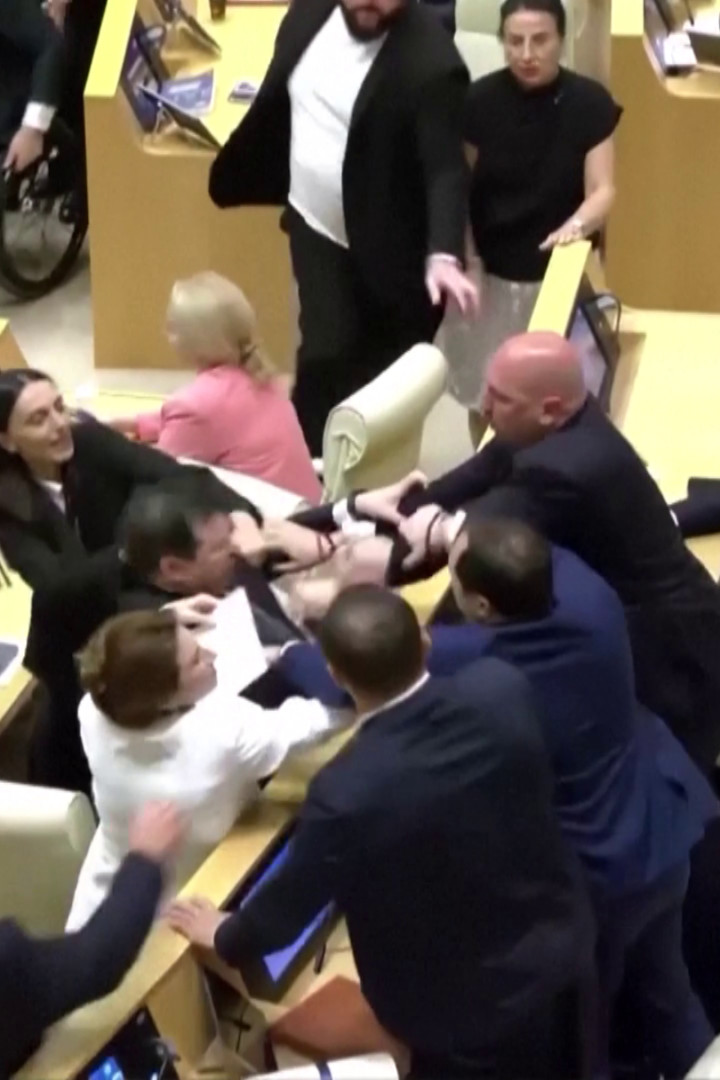 Georgian lawmakers brawl in parliament during PM's annual report
