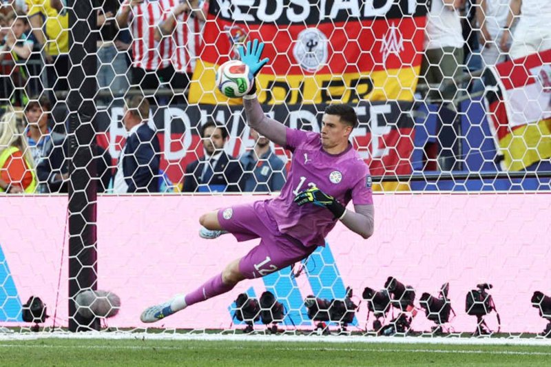 Paraguay's Orlando Gill saves a penalty from Germany's Kai Havertz during the penalty shootout. REUTERS