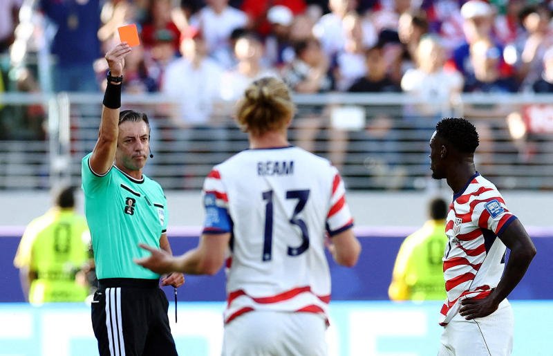 US striker Folarin Balogun is shown a red card by referee Raphael Claus during the Fifa World Cup 2026 Round of 32 match between the United States and Bosnia and Herzegovina at San Francisco Bay Area Stadium, Santa Clara, California, on July 1, 2026. (Photo: Reuters)