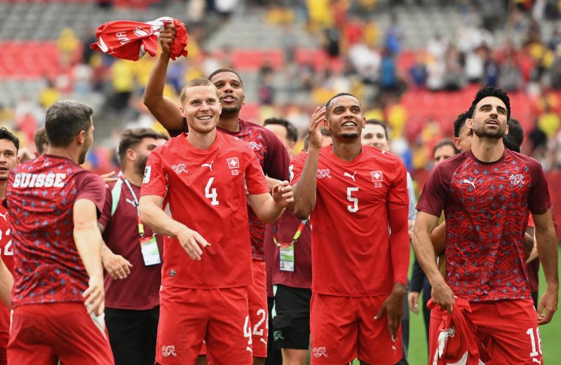 Switzerland's Nico Elvedi, Manuel Akanji and Eray Comert celebrate after the penalty shootout as Switzerland qualify for the quarter finals of the World Cup. (Photo: Reuters)