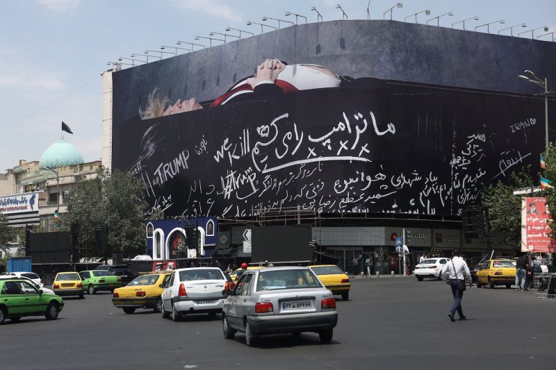A billboard depicting US President Donald Trump laid in a coffin is seen on a building in Tehran on July 18, 2026. (West Asia News Agency via Reuters)