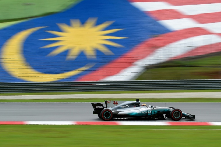 Lewis Hamilton races at the 2017 Malaysian Grand Prix while driving for Mercedes