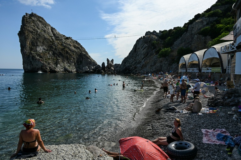 Tourists visit a beach at Simeiz in Crimea. Ukraine has been targeting the occupied Black Sea territory more regularly. (Photo: AFP)
