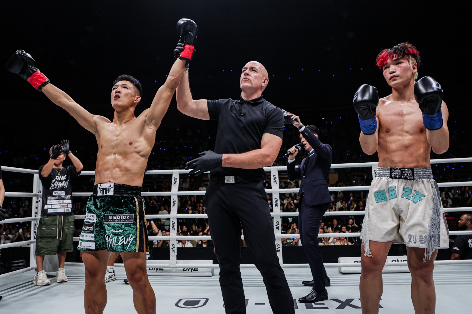 Masaaki Noiri has his hand raised after avenging his 2024 loss to Liu Mengyang with a first-round knockout