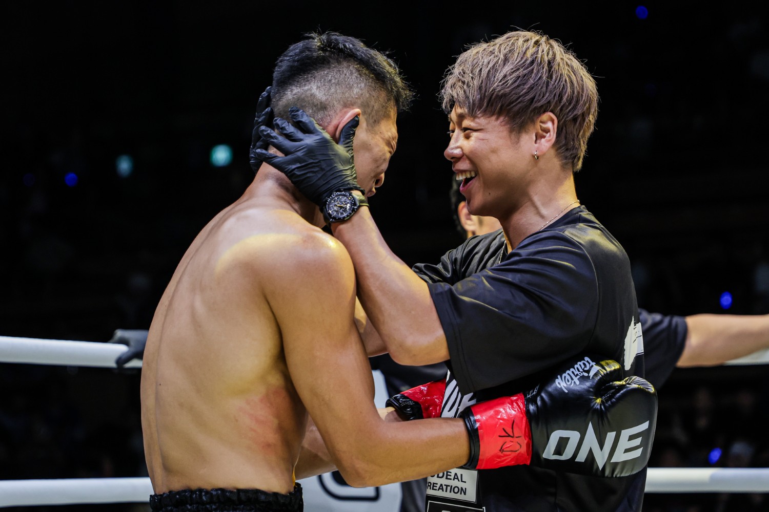 Masaaki Noiri celebrates with cornerman and teammate Takeru Segawa after beating Liu Mengyang at ONE Samurai 2