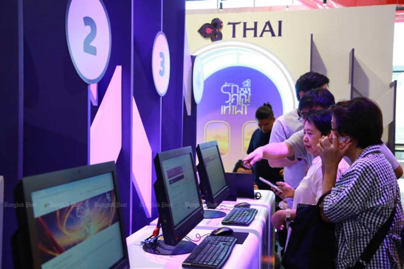 Thai Airways International organises an event to mark its 66th anniversary at a shopping centre in Bangkok in June. Somchai Poomlard