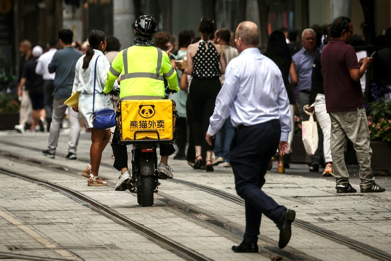 The order from Australia's Fair Work Commission issued Tuesday will see delivery drivers working for online platforms like UberEats and DoorDash earn Aus$31.30 (731.56 baht) an hour