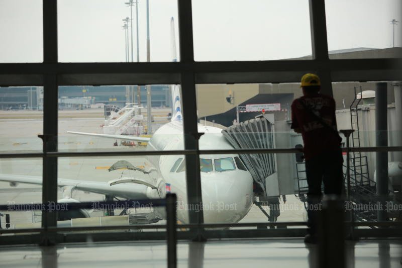 A plane is parked at Suvarnabhumi Airport. (Photo: Somchai Poomlard)