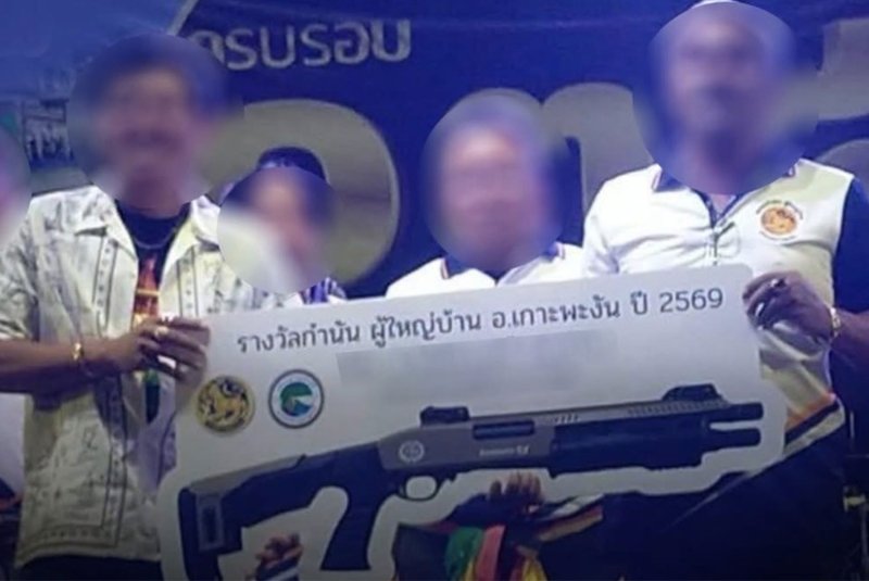 Participants take part in the annual celebration for kamnan and village headmen on Koh Phangan in Surat Thani organisers, where five shotguns were offered as prizes. (Photo supplied)