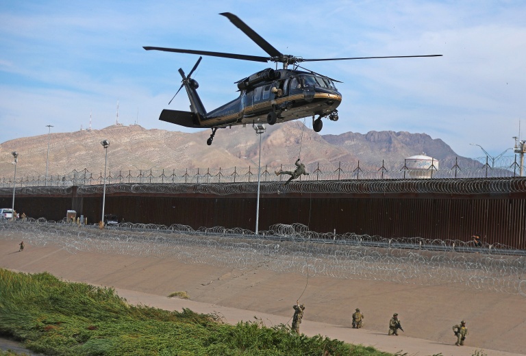 Numerous police and military vehicles from both countries travelled along the Rio Grande, a natural border closely monitored by the US.
