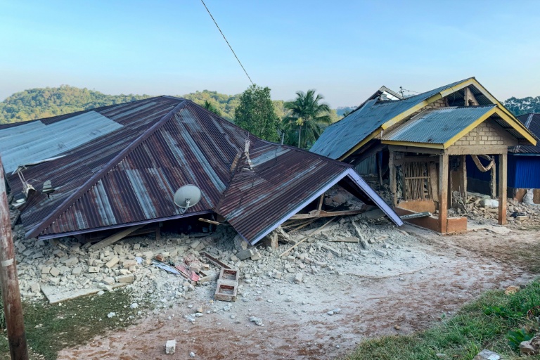 Damaged houses are seen following a 7.7-magnitude earthquake in Ruteng, Manggarai, East Nusa Tenggara, on Saturday. (Photo: AFP)