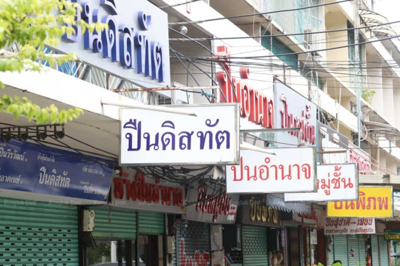 Gun shops in Wang Burapha area, Bangkok, on Sunday. Apichart Jinakul