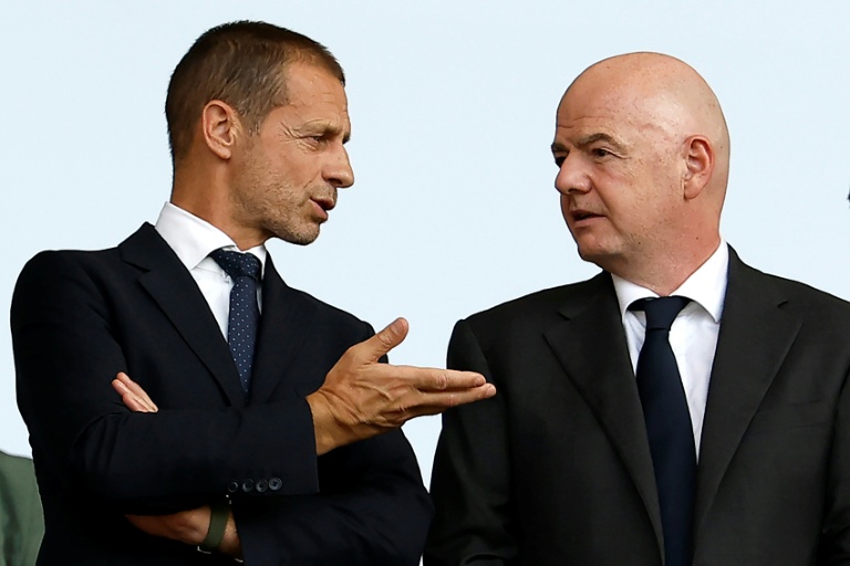 UEFA president Aleksander Ceferin, left, and Fifa president Gianni Infantino are in open conflict. (Photo: AFP)
